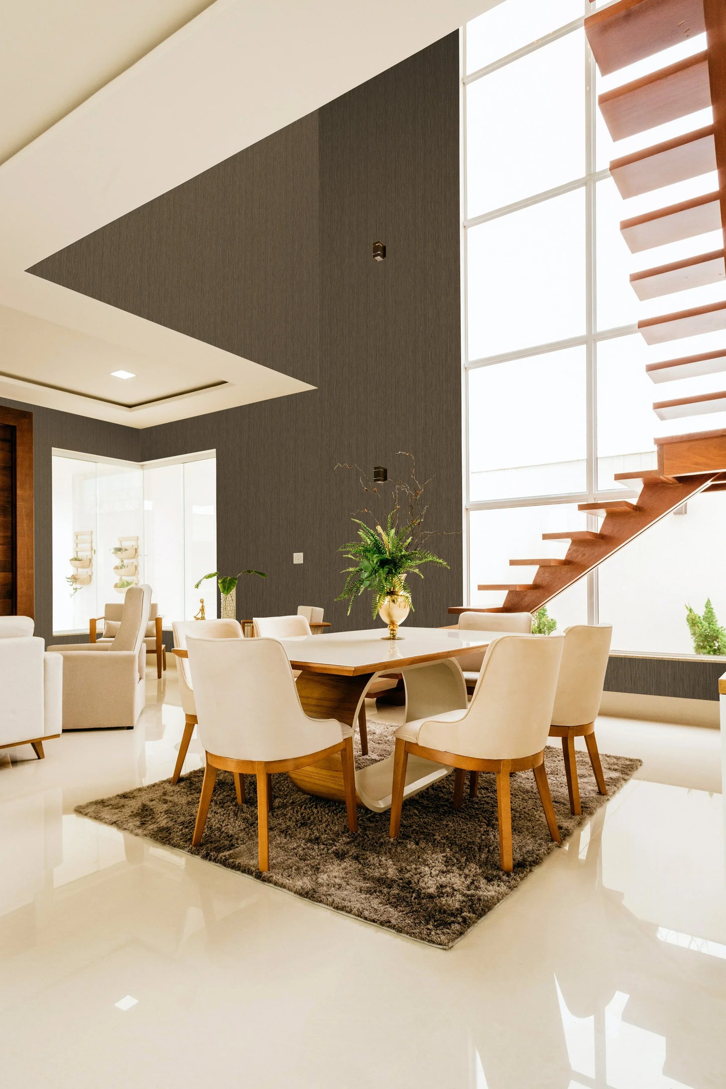 Bright dining area with light wood table, six chairs, and Textile Effect Vertical Wallpaper for a modern touch.