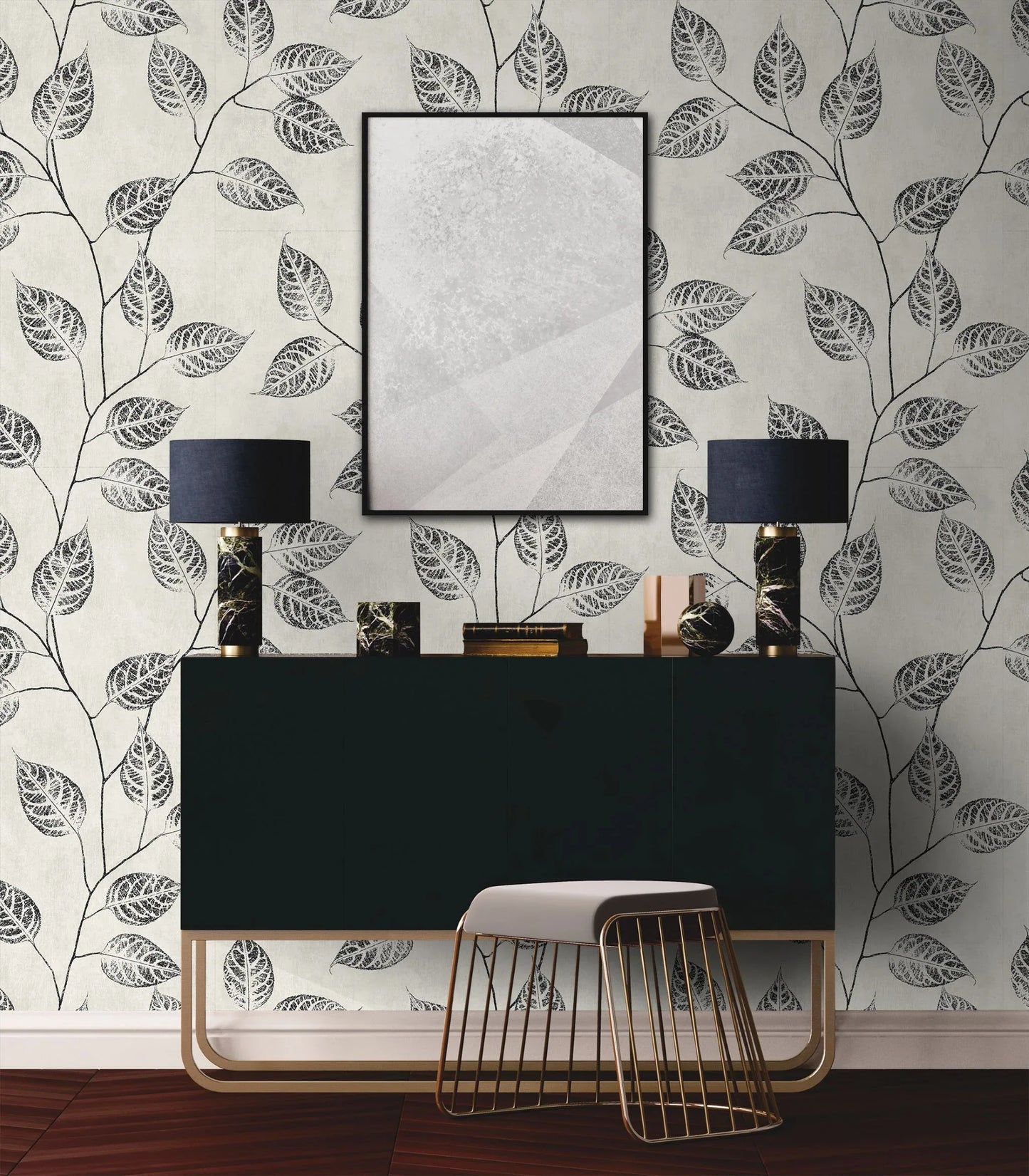 Modern interior design with a black console table, lamp, and decorative items against a wall decorated with Black & Beige Branch Of Leaves Wallpaper.