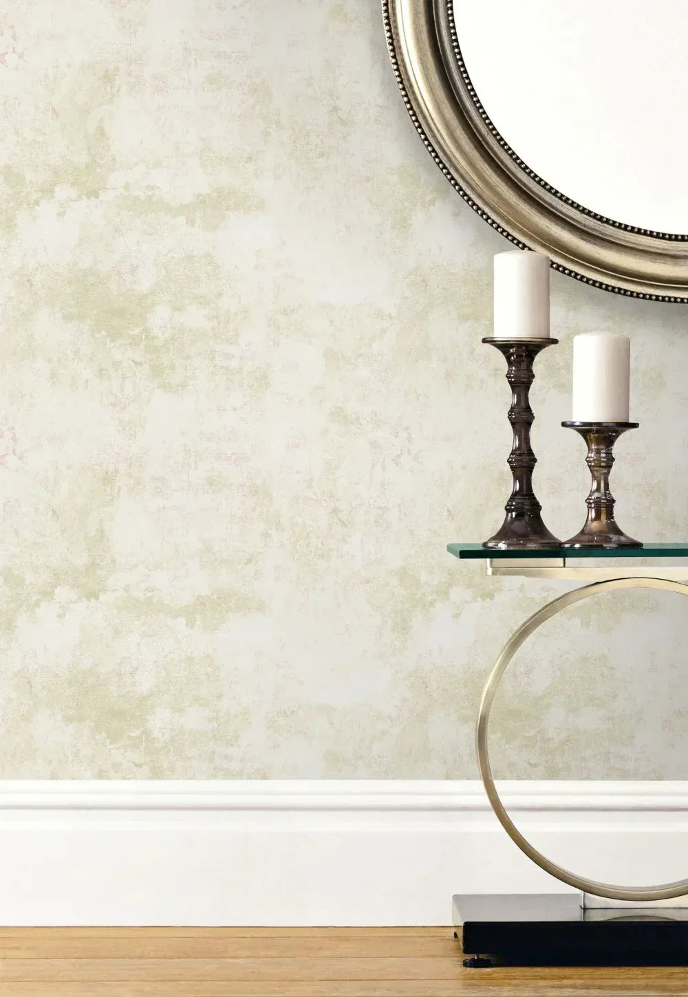 The Spatula Marble Wallpaper pairs well with a modern table, two candles, a round mirror, and a light wood floor.