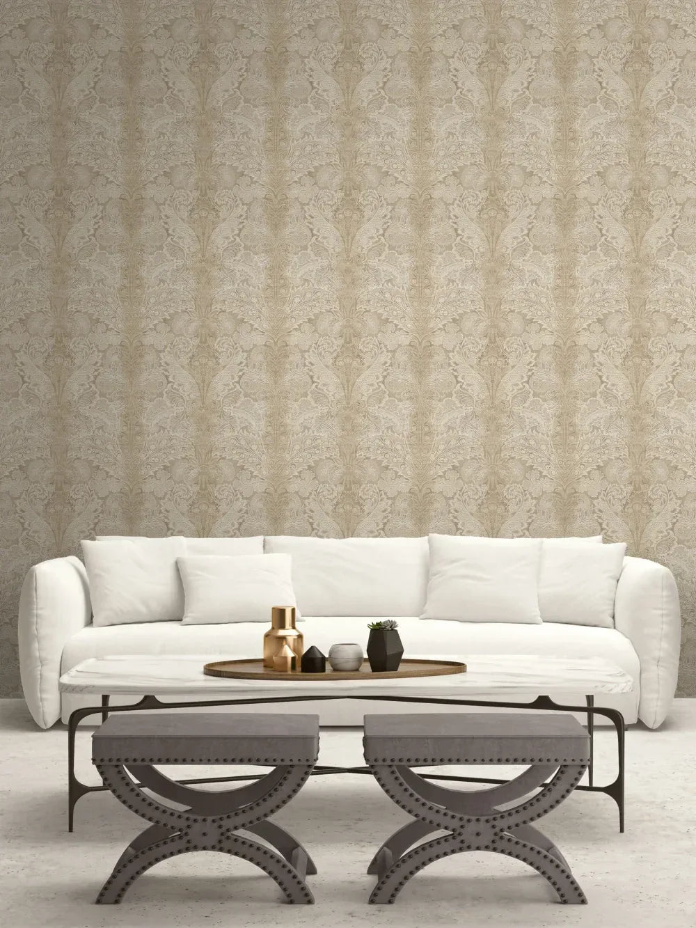 White sofa with Old Damask Wallpaper, two metal stools, and a round coffee table in a modern living room.