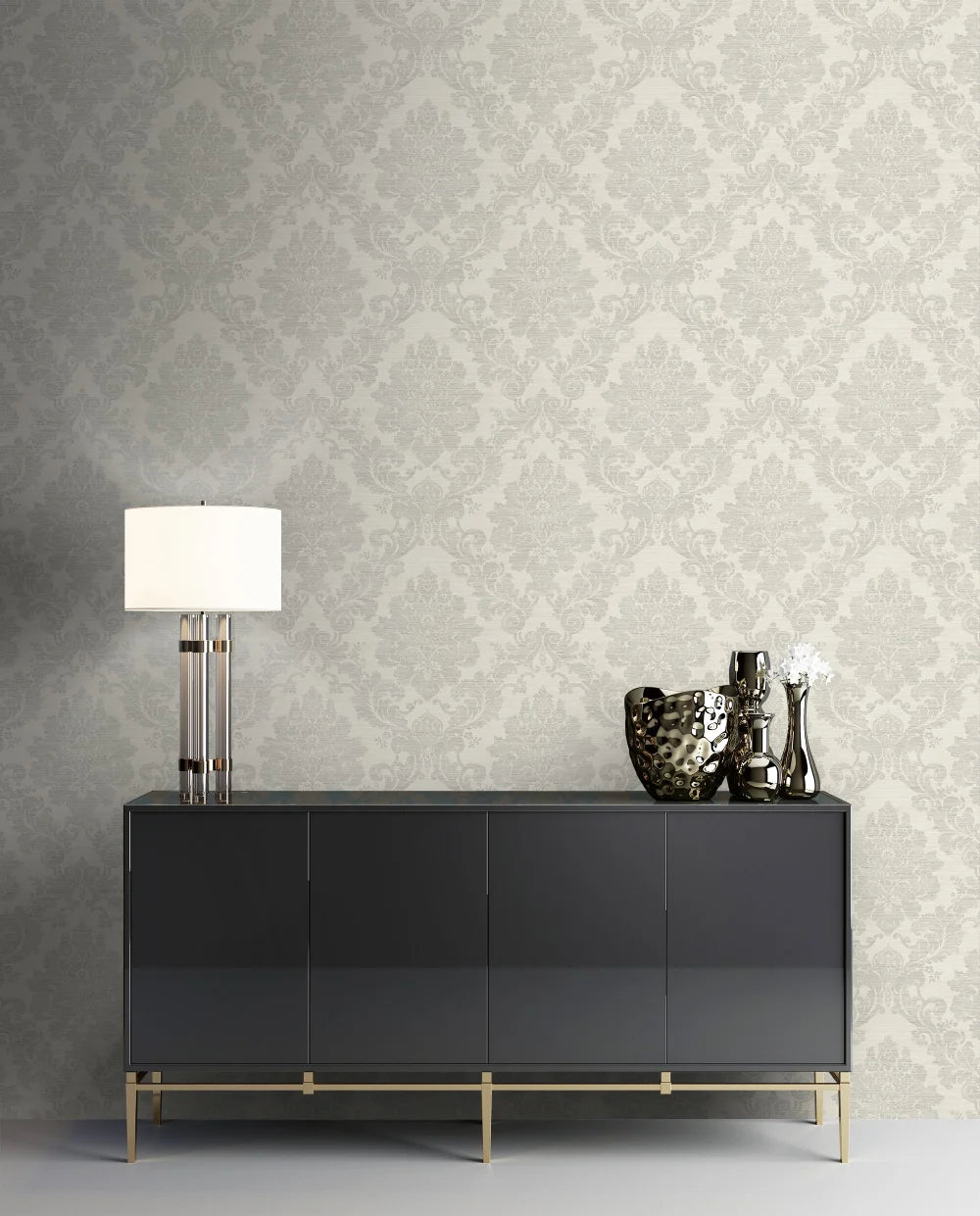 Black sideboard with decorative items against a patterned Gray Textile Damask Wallpaper.
