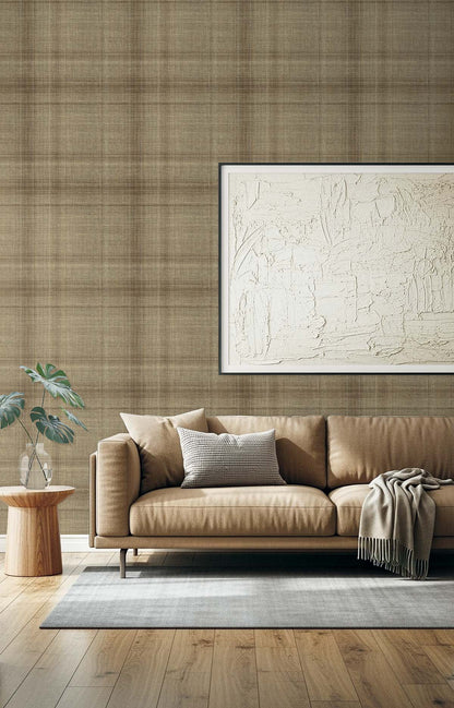Modern living room with tan sofa, gray rug, plant, art, and Brown Taupe Textured Plaid Commercial Vinyl wall.