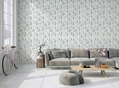 Modern living room with gray sofa, wood table, pink bike Botanical Bali Leaf Commercial Vinyl wallpaper. Sunlit windows.