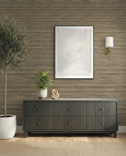 Modern sideboard with two plants, abstract wall art, and sconces on Faux Grasscloth Commercial Vinyl wallpaper.