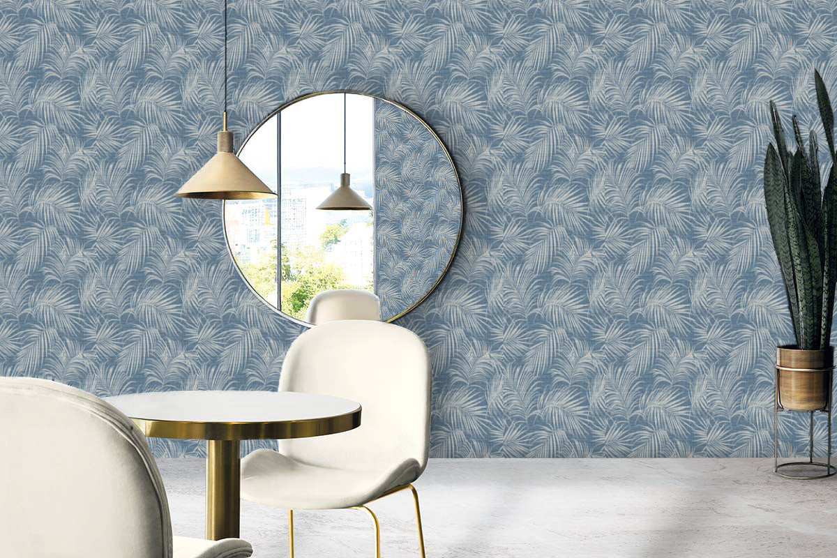 Modern dining area with white chairs, round table, gold pendant, mirror, and Palm Grassland Commercial Vinyl wallpaper.