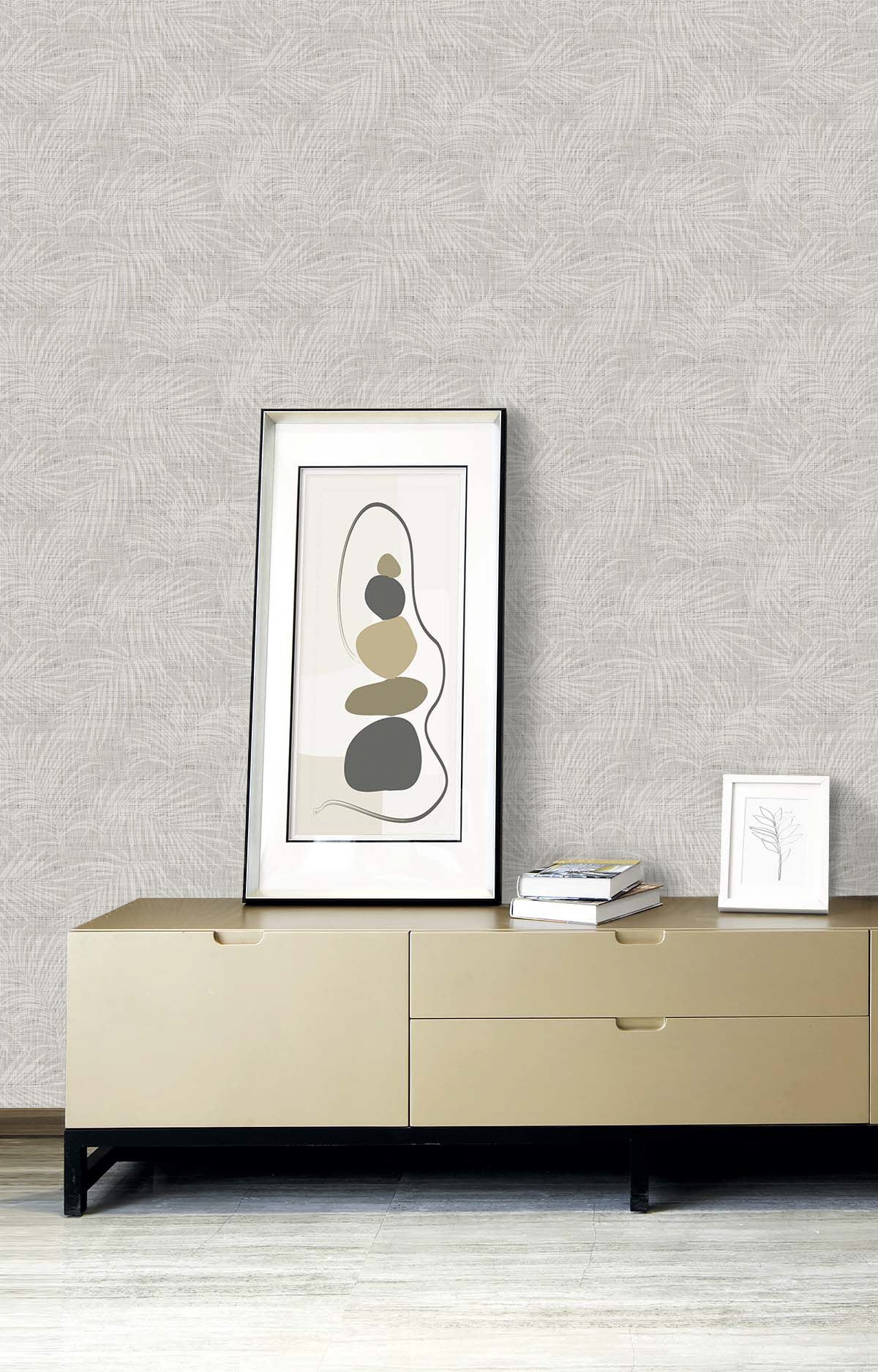 A minimalist sideboard holds abstract art, books, and a chic botanical print against Palm Grassland Commercial Vinyl.