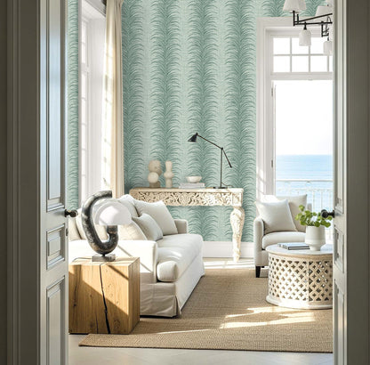 Bright coastal modern space featuring Tropical Bali Leaf Stripe Commercial Vinyl, white furniture, and an ocean view.