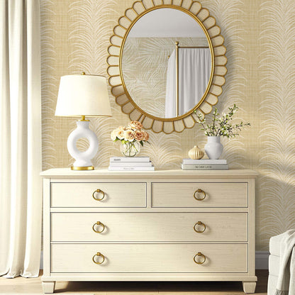 Beige dresser with gold handles and mirror set against Tropical Bali Leaf Stripe Commercial Vinyl wallpaper.