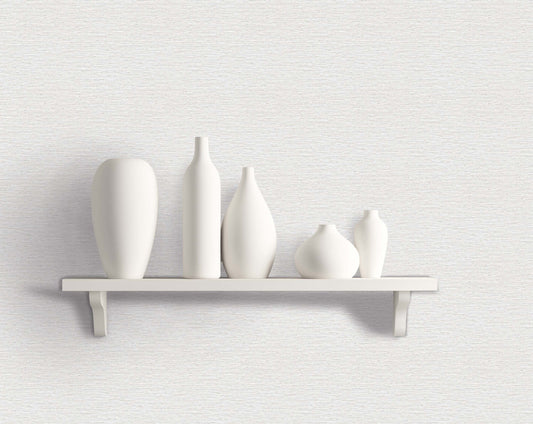 A white shelf with five matte vases stands against Texture Grasscloth Effect Vinyl, adding style to a modern space.