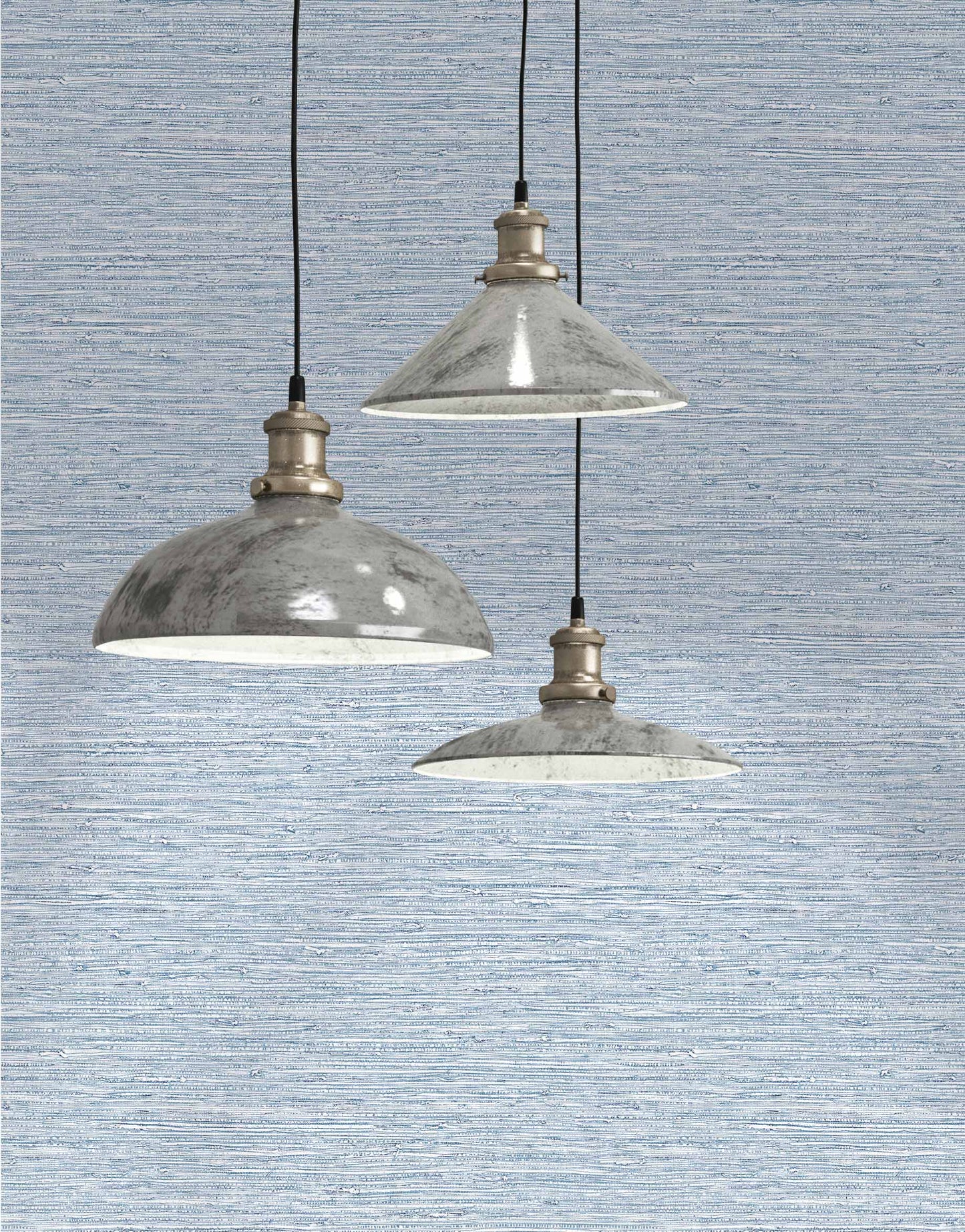 Three gray industrial pendants hang against a Texture Grasscloth Effect Commercial Vinyl wallpaper background.