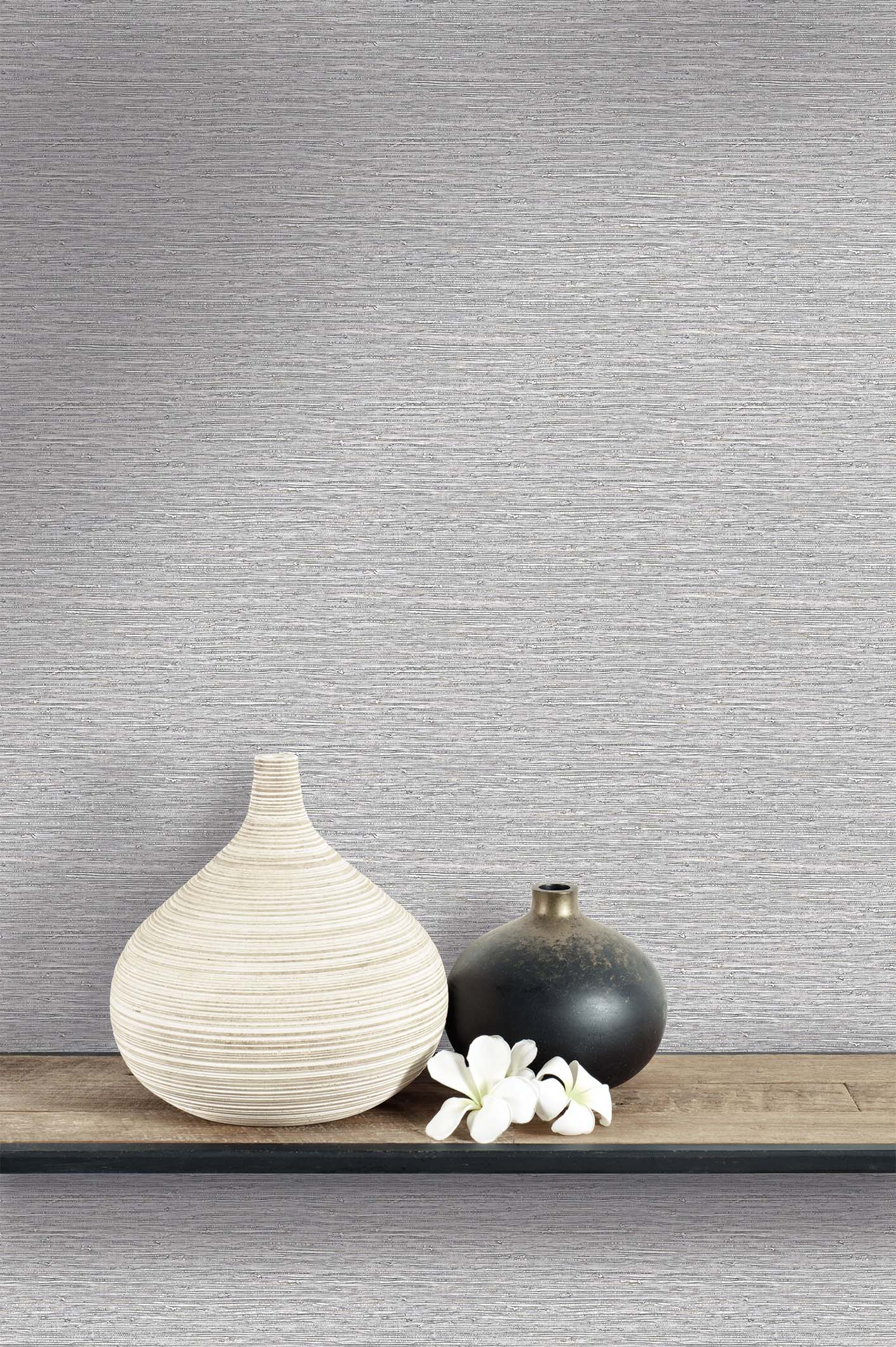 Two vases with white flowers adorn a shelf, set against Texture Grasscloth Effect Commercial Vinyl wallpaper.