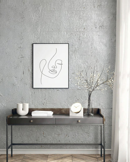 Minimalist console table with decor, abstract art, and vase by a window featuring Algarve Cork Grasscloth Naturals wallpaper.