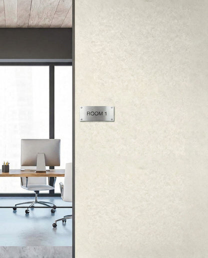 Modern office with desk, chair, large window, and ROOM 1 sign on Florence Leather Commercial Vinyl wallcovering.