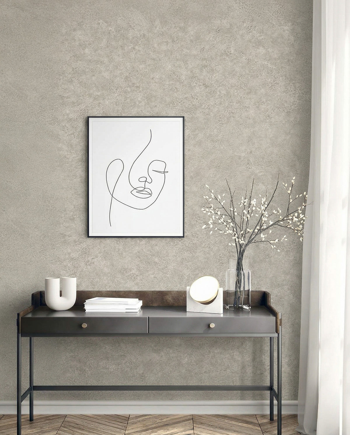 Minimalist console table with decor, abstract face art, and Florence Leather Commercial Vinyl wallpaper on gray wall.