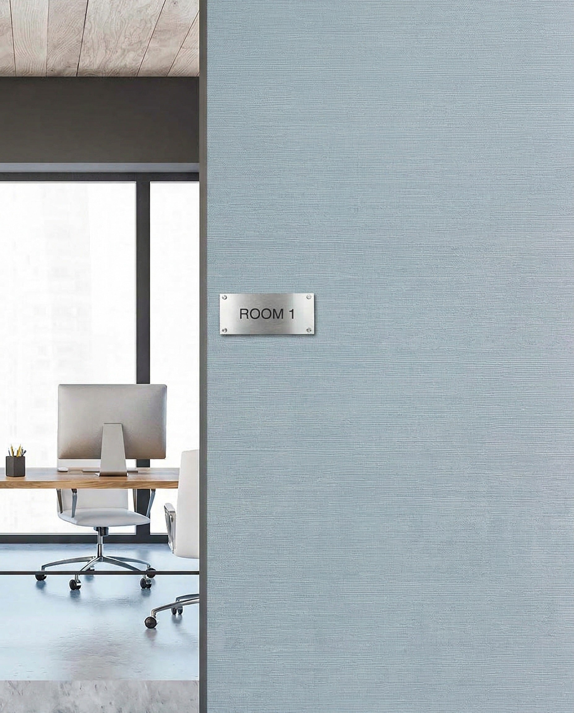 Modern office with desk and chair; ROOM 1 sign pairs well with Sisal Texture Grasscloth Naturals wallpaper.