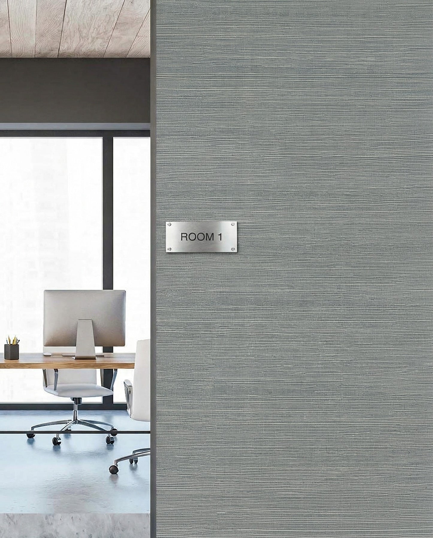 A modern office with a desk and chair is seen through a Room 1 doorway on Sisal Texture Grasscloth Naturals wallpaper.