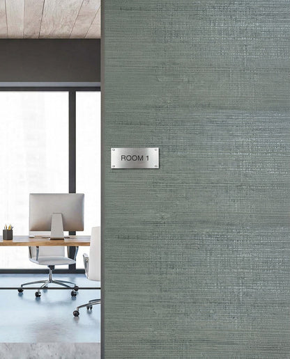 A modern office with a desk and chair is seen through a doorway labeled Room 1 on Straw Texture Grasscloth Naturals.