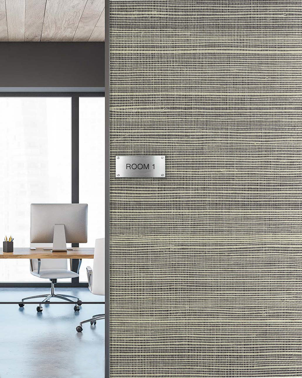 Modern office with Sisal Texture Grasscloth Naturals wallcovering and a ROOM 1 sign beside desk, large windows.