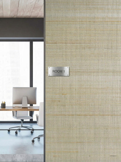 Office space with desk and chair seen through a "ROOM 1" doorway on Bamboo Fabric Grasscloth Naturals wallcovering.
