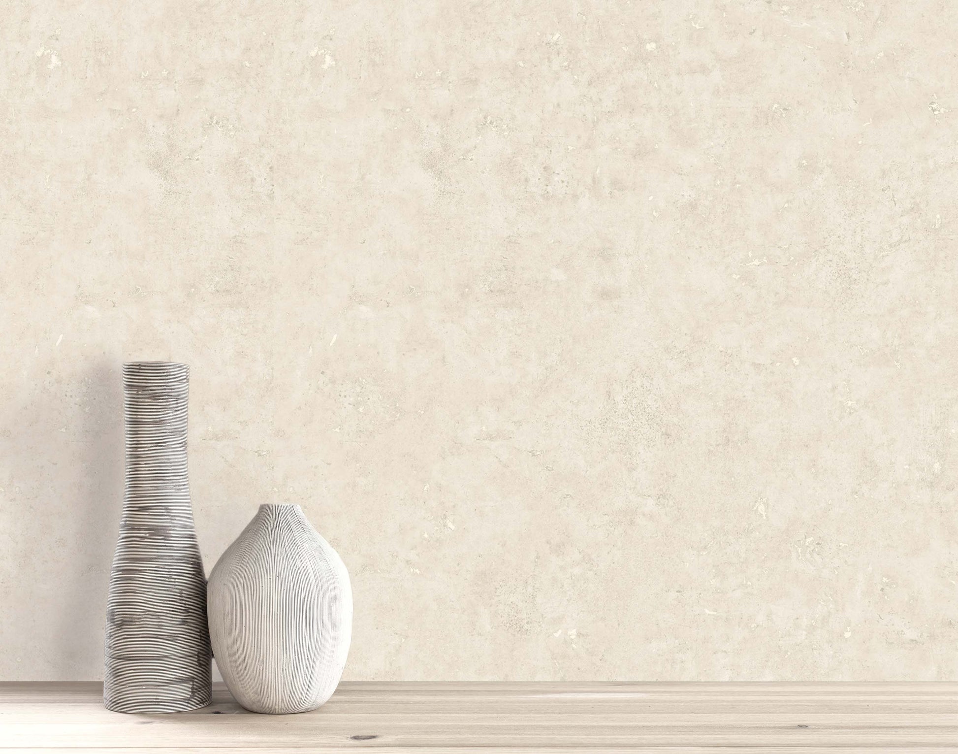Two vases sit on light wood in front of a Cement Commercial Vinyl beige faux wallpaper wall.