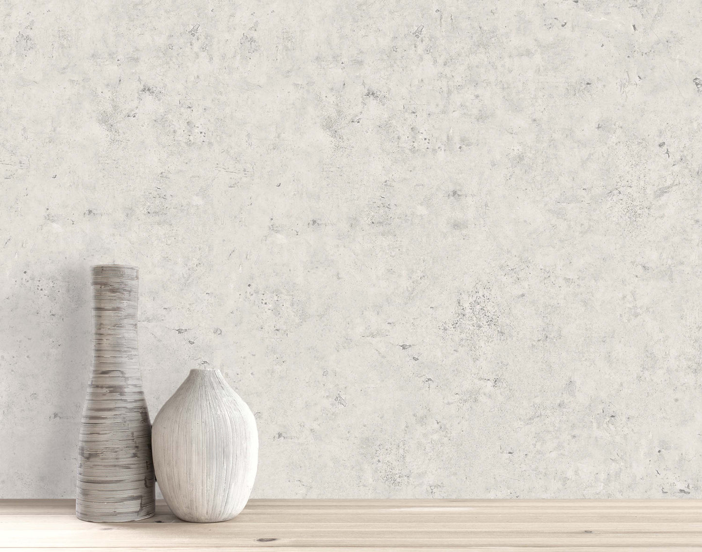 Two Cement Commercial Vinyl vases sit on wood with a light gray concrete faux wallpaper backdrop.