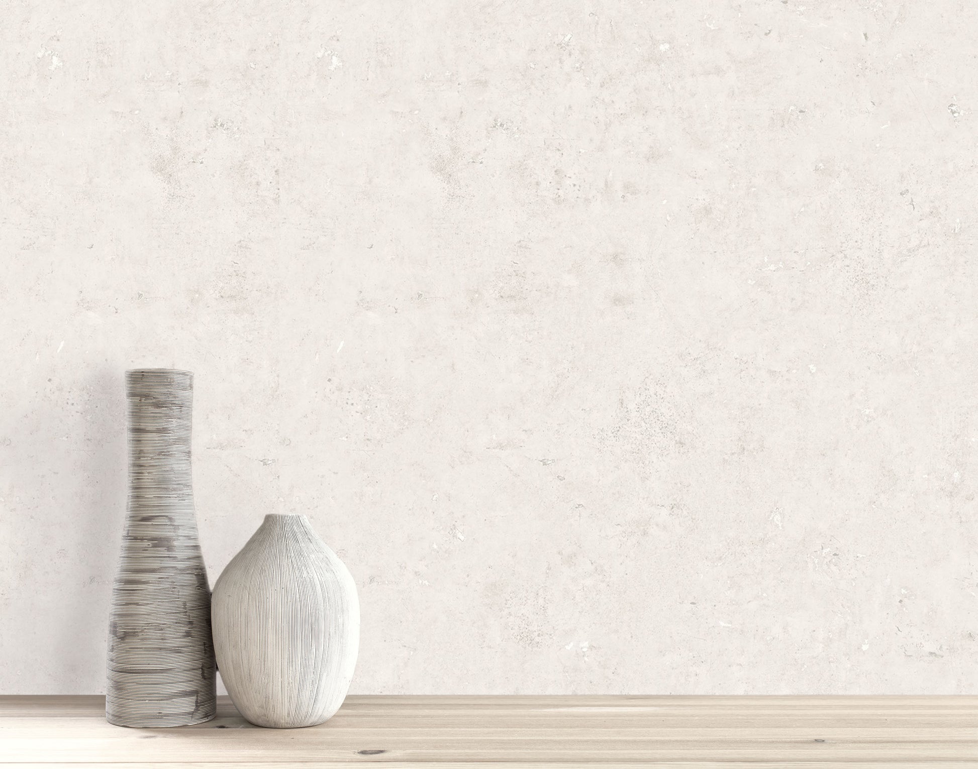 Two decorative vases sit on a light wood surface against Cement Commercial Vinyl faux unpasted wallpaper.