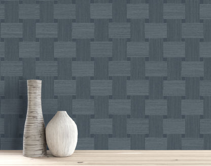 Two decorative vases on wood in front of a blue Basket Weave Commercial Vinyl wallcovering.