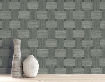 Two vases on a light wood surface in front of gray Basket Weave Commercial Vinyl wallcoverings.