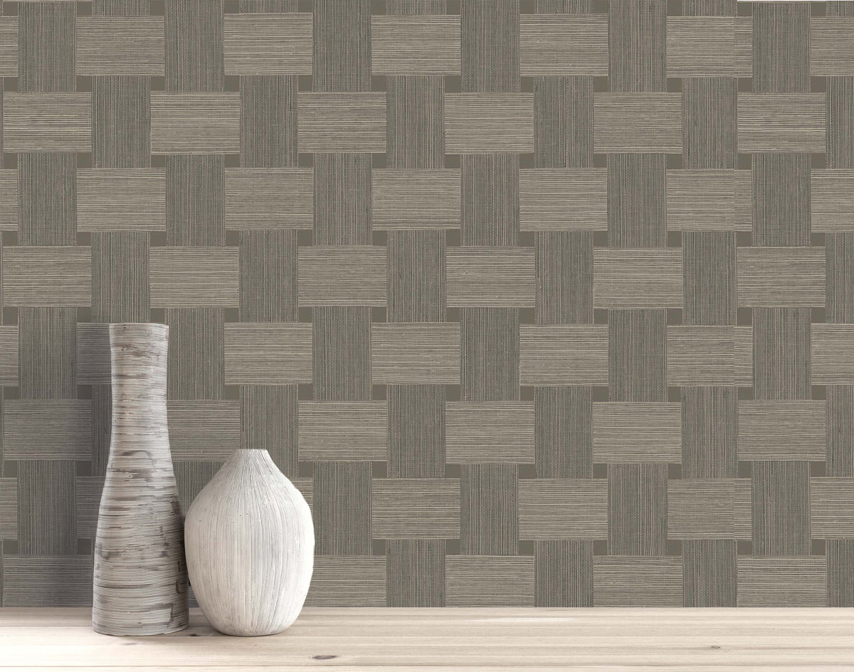 Two textured ceramic vases on wood, paired with Basket Weave Commercial Vinyl geometric wallcoverings in gray and beige.