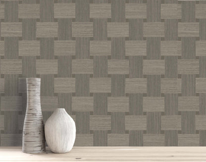 Two textured ceramic vases on wood, paired with Basket Weave Commercial Vinyl geometric wallcoverings in gray and beige.
