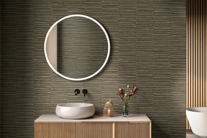 Bathroom interior with a round mirror, sink, and decorative items against a wall decorated with Brown Industrial Grasscloth Stripe Commercial & Vinyl.
