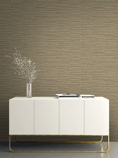 White sideboard with gold accents against a wall decorated with Tawny Brown Industrial Grasscloth Stripe Commercial & Vinyl.
