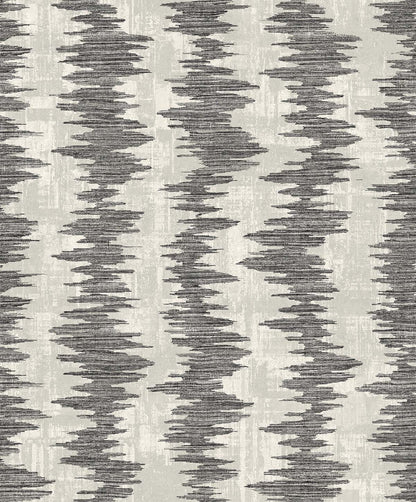 Ikat Stripe Wallpaper features jagged, vertical zigzag gray lines on a light gray, washable background.