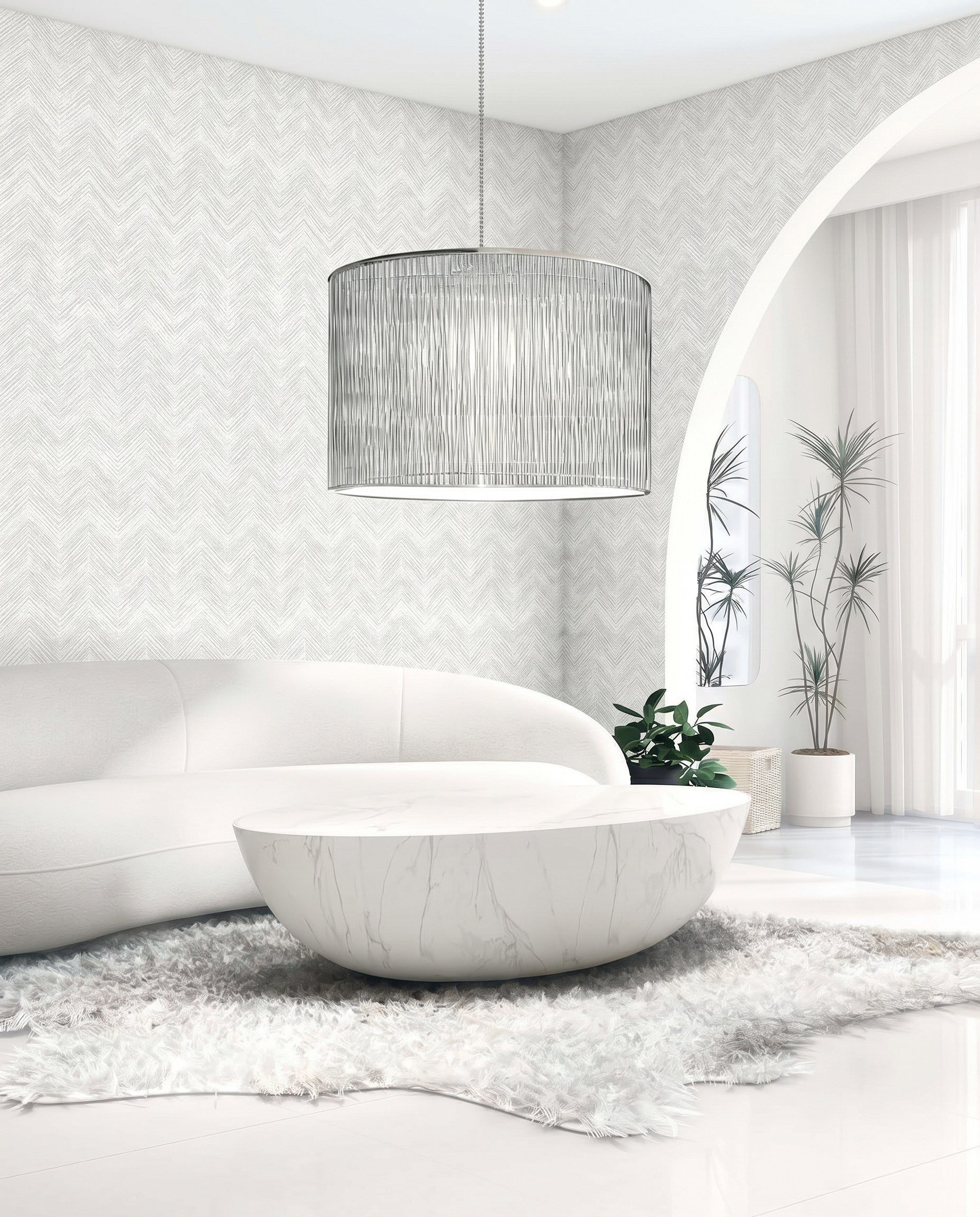 Modern living room with a white curved sofa, round marble coffee table, and Chevron Wallpaper for easy maintenance.