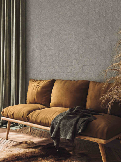 Cozy living room with a brown velvet sofa, green curtains, and textured gray Inlay Tile Wallpaper on the wall.