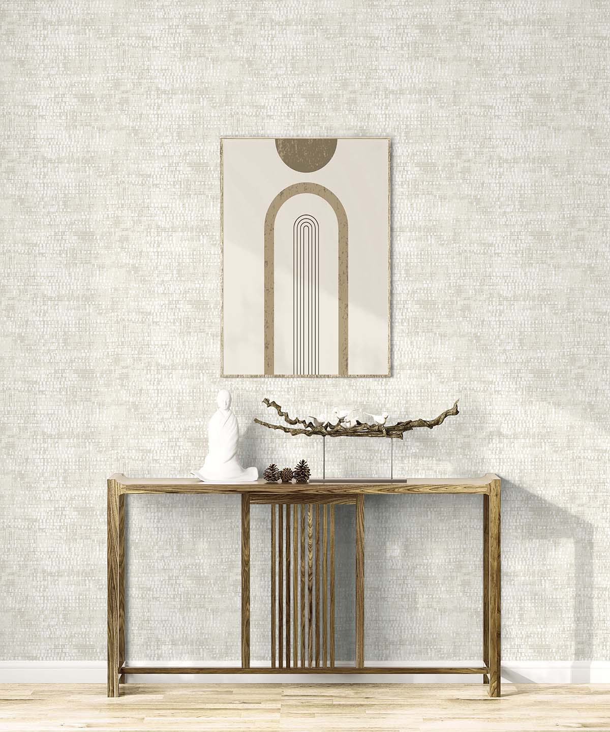 Minimalist console table and abstract art on a textured light wall with Dotted Wallpaper, non-woven and washable.