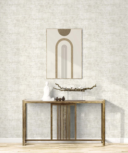 Minimalist console table and abstract art on a textured light wall with Dotted Wallpaper, non-woven and washable.