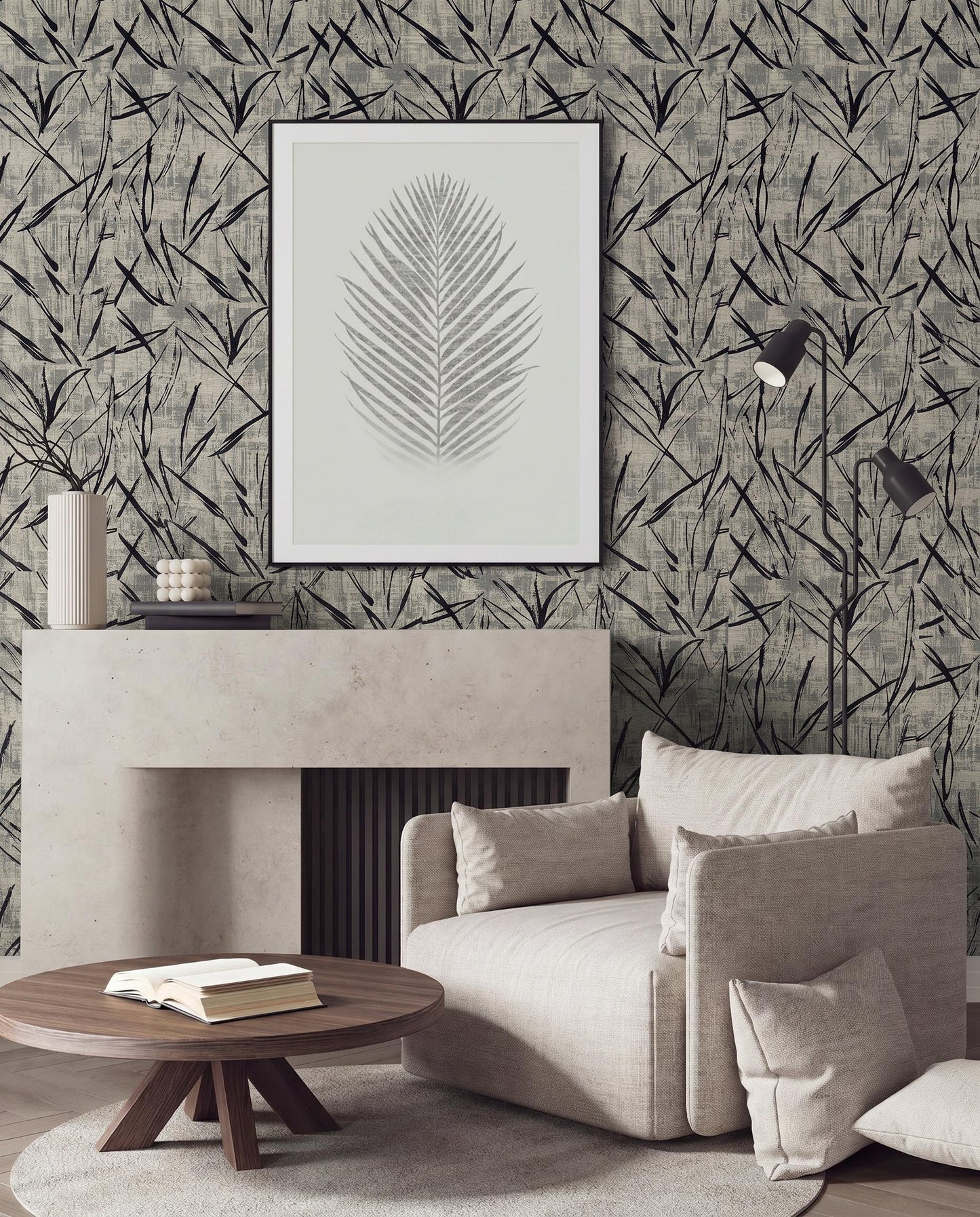 Modern living room with neutral furniture, a round coffee table, and washable Brushstroke Wallpaper with framed leaf art.