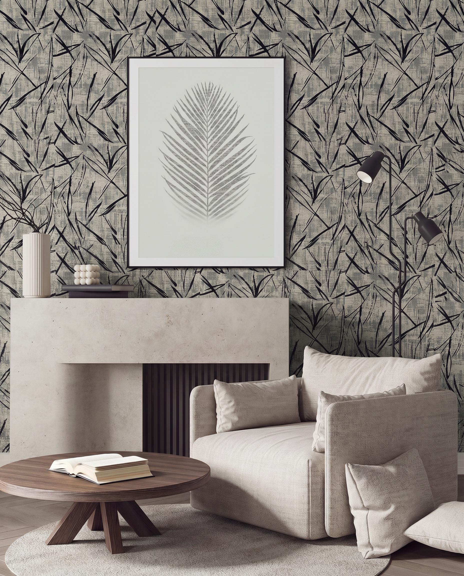 Modern living room with neutral furniture, a round coffee table, and washable Brushstroke Wallpaper with framed leaf art.