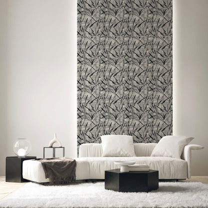 Modern living room with white sofa, black tables, and a tall wall panel featuring Brushstroke Wallpaper.