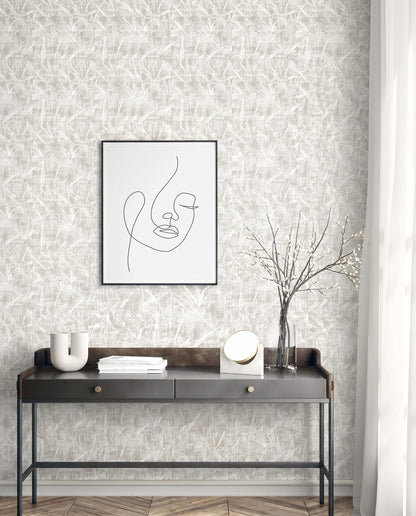 Minimalist console table with decor under line art, set against a wall with Brushstroke Wallpaper.