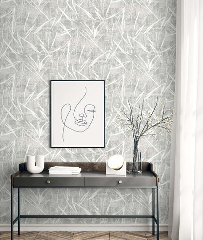 A modern console table sits against Brushstroke Wallpaper, with minimal line art decor hanging above.