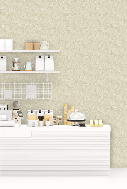 Minimalist coffee counter with cups and pastries against a beige patterned Fan Wallpaper.