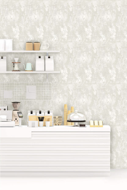 Minimalist coffee shop counter with cups, pastries, and shelves set against Faux Concrete Wallpaper backdrop.