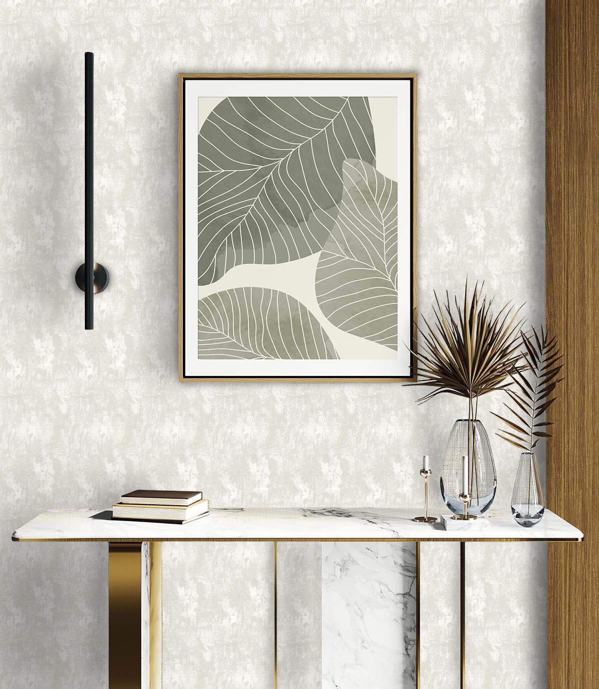 Minimalist entryway with a marble console table, books, glass vases, and abstract leaf art on faux concrete wallpaper.
