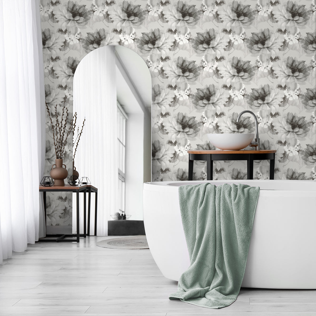 Bathroom wall decorated with Silver Aquarelle Floral Peel & Stick Casa Mia Wallcovering white bathtub, and green towel.