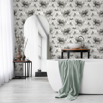 Bathroom wall decorated with Silver Aquarelle Floral Peel & Stick Casa Mia Wallcovering white bathtub, and green towel.