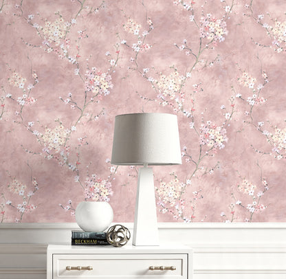 Lamp on a white dresser with Pink Blossom Branch Peel & Stick Casa Mia Wallcovering in the background.