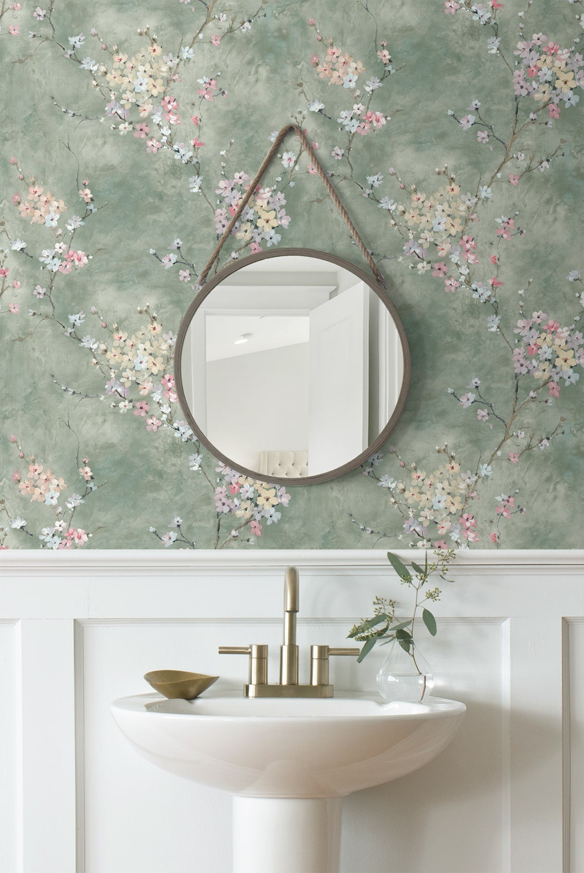 Round mirror with Green Blossom Branch Peel & Stick Casa Mia Wallcovering in a bathroom setting.