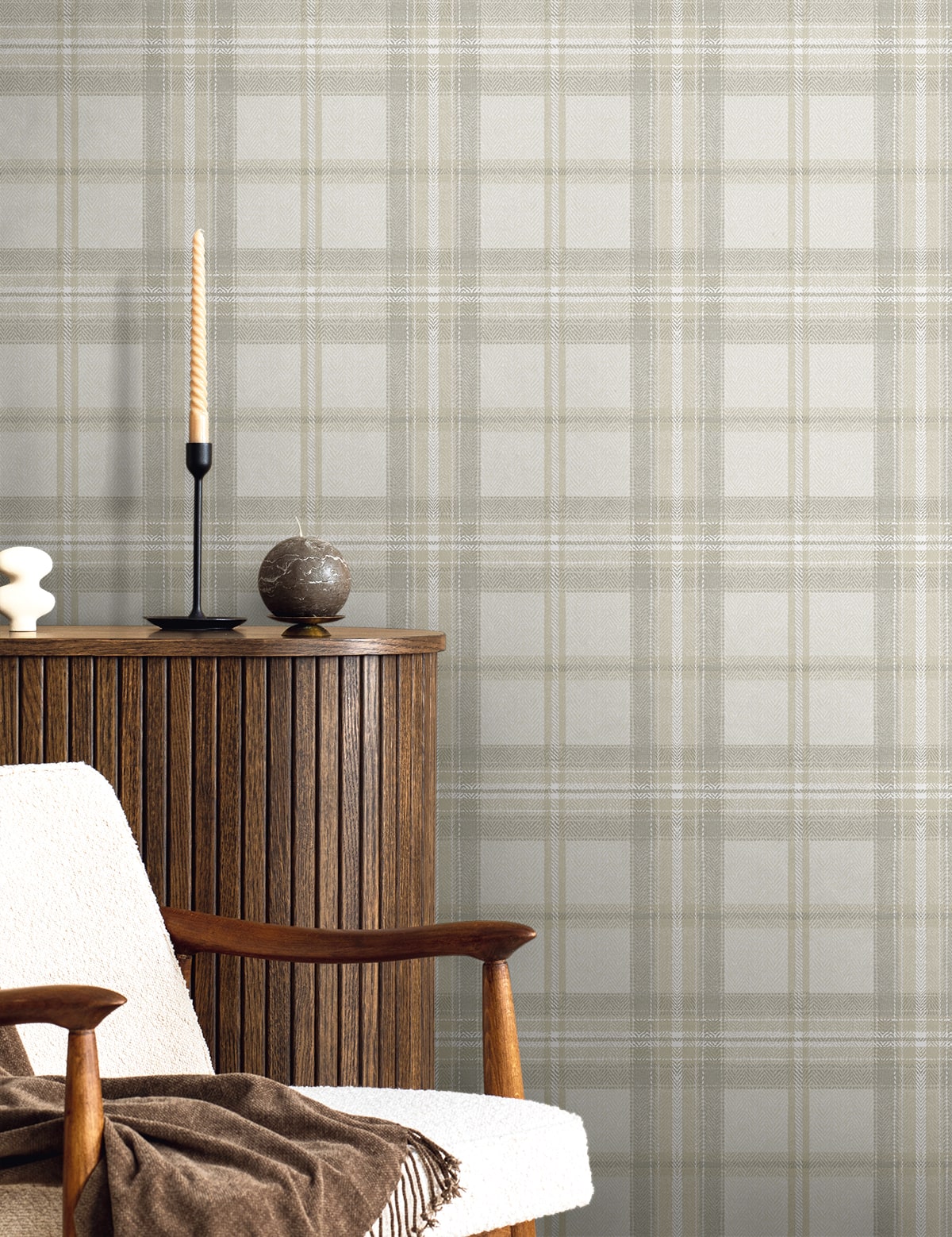 Armchair with wooden furniture next to it with ornaments against a wall decorated with Gray Broken Twill Plaid Peel & Stick Casa Mia Wallcovering.